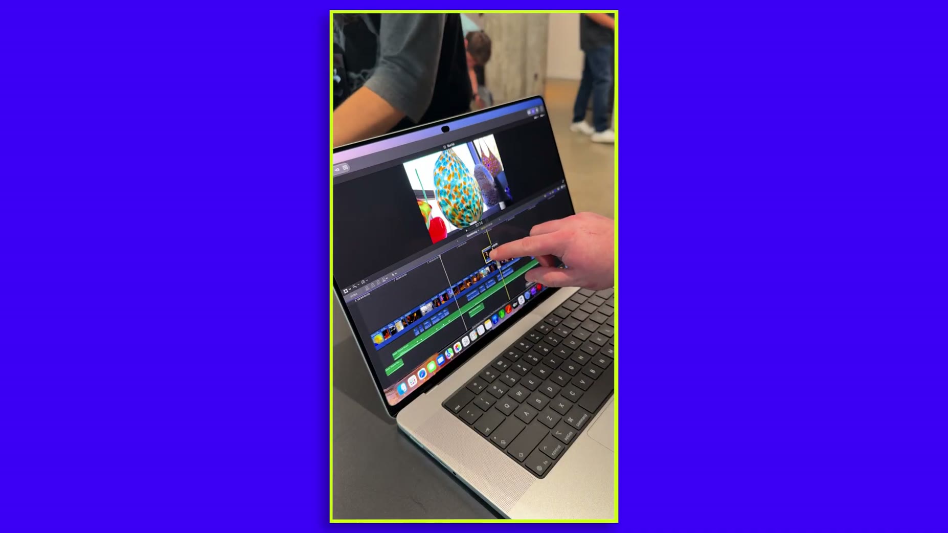 The touch features highlighted for the MacBook include swiping through timelines in video editing apps and pinching to z